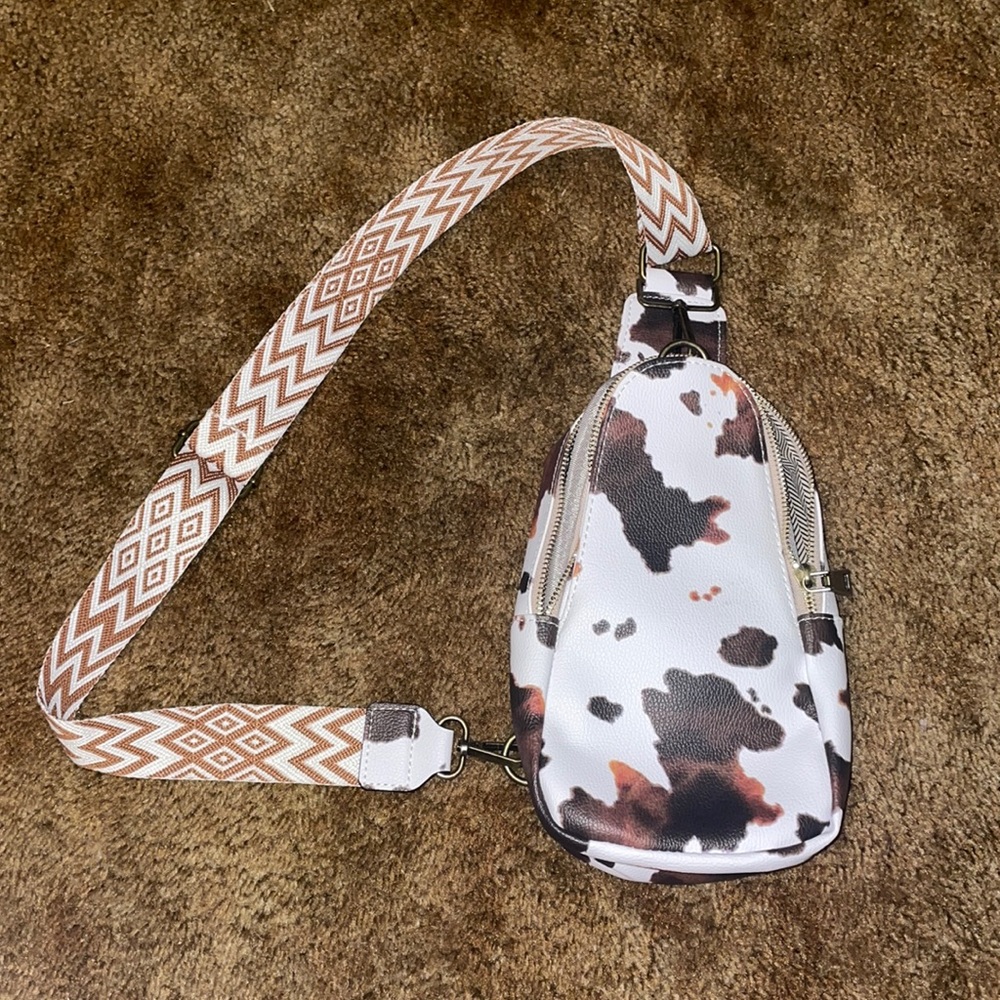 Cow print sling bag